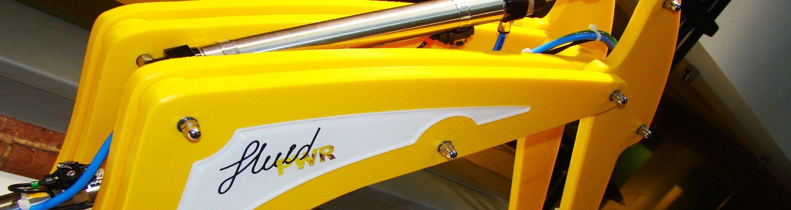 The demonstration digger arm above its activity surface.