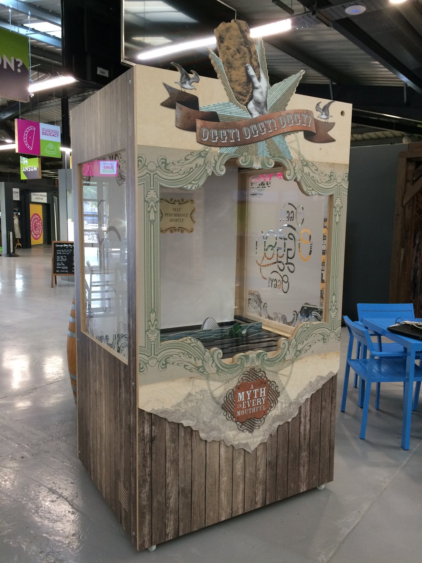 Oggy Oggy Automata: the decorated enclosure and stage opening.