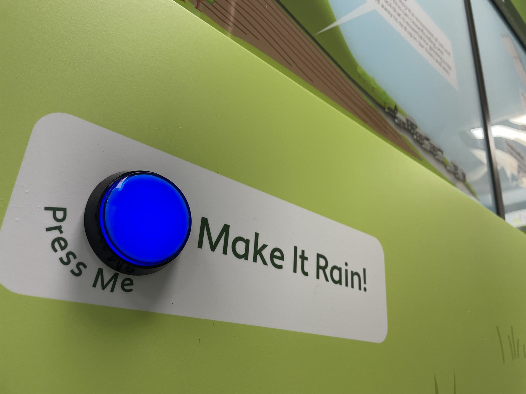 The push-button control used to start the rainfall demonstration.