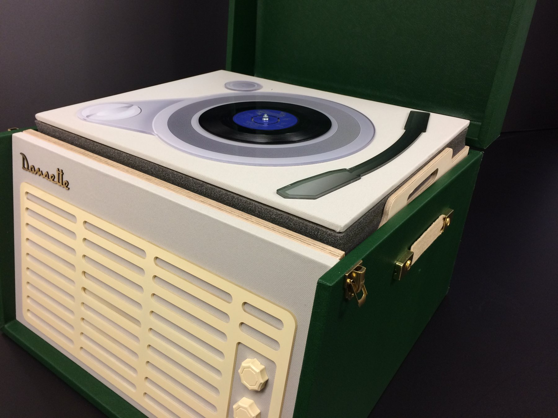 The record-player-style memory box with the lid raised.