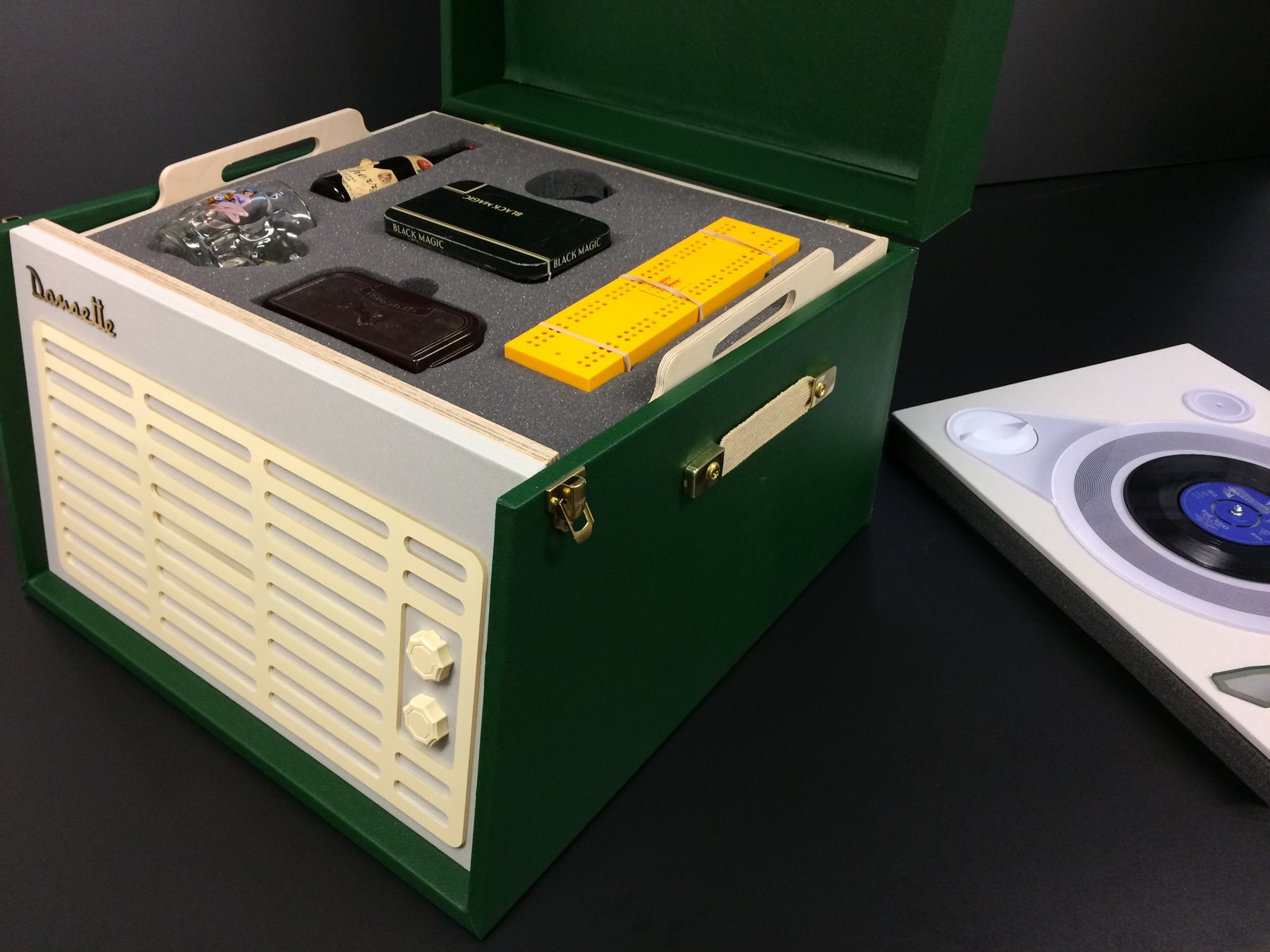 Vintage Record Player Memory Box: artefacts displayed inside the storage compartment.