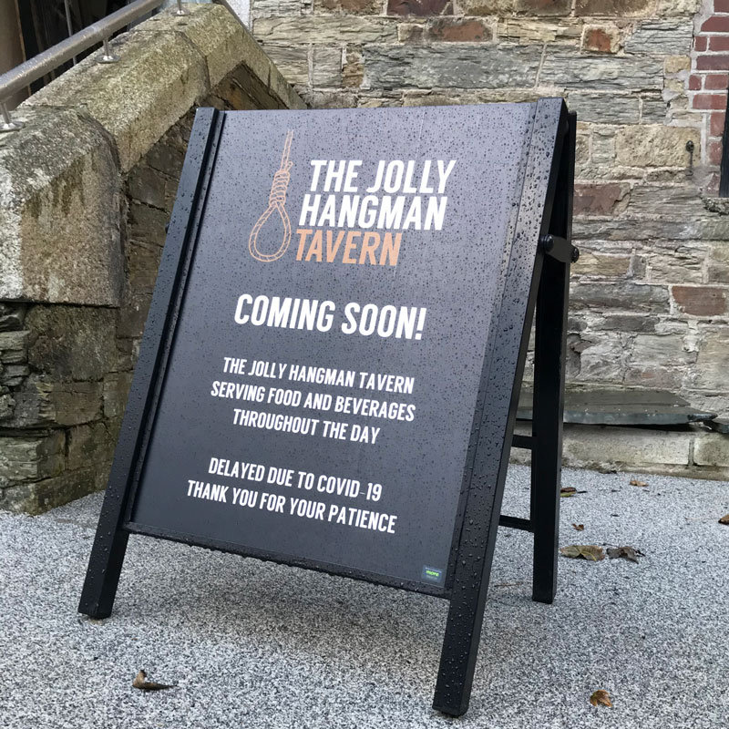 Pavement signs with custom printed graphics