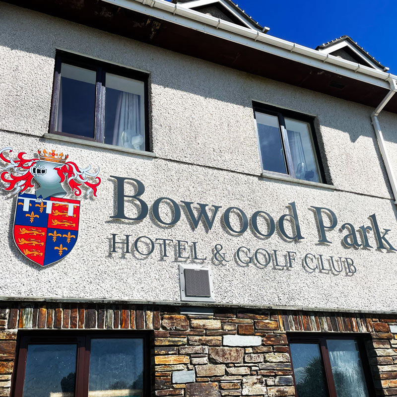 Hotel & golf club signage in Camelford, Cornwall with sponsorship signs and main building cut lettering