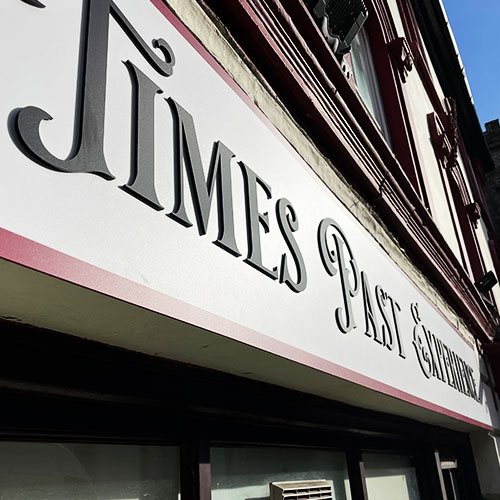 Shop signage in Launceston with cut lettering and simple boarder