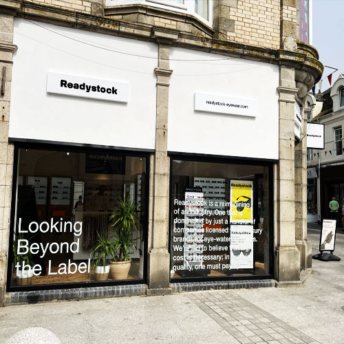 Good quality shop signage with simple design, folded white pans and black lettering in Newquay