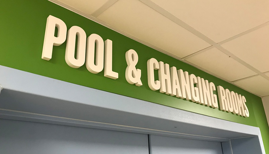 Swimming pool and changing room signage carterton