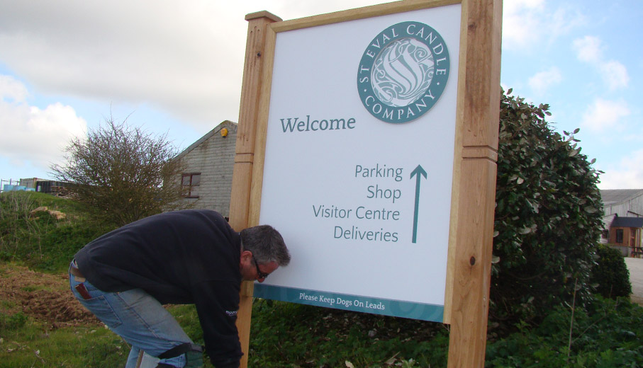 Oak post mounted sign for entrace to vistor centre and shop