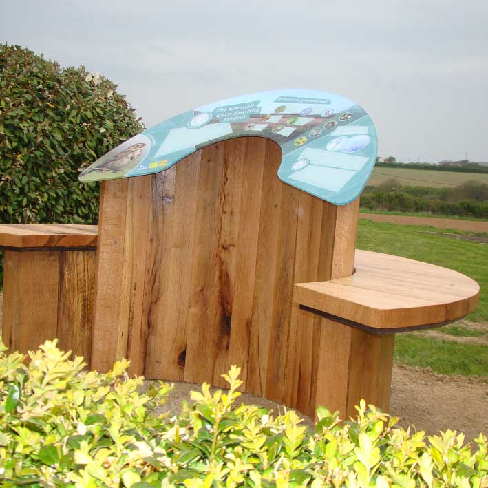 interpretation bench manufactured from solid oak with curved acrylic graphics