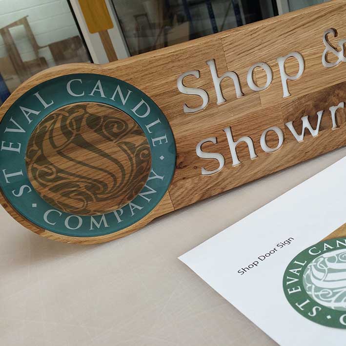 CNC cut oak sign with acrylic inlay by More Creative