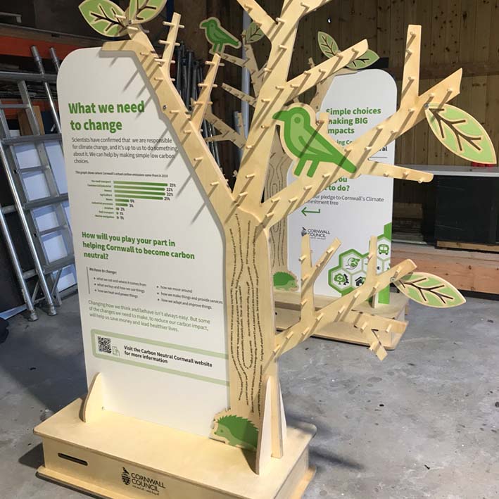 sustainable exhibition stand in shape of tree for carbon pledges