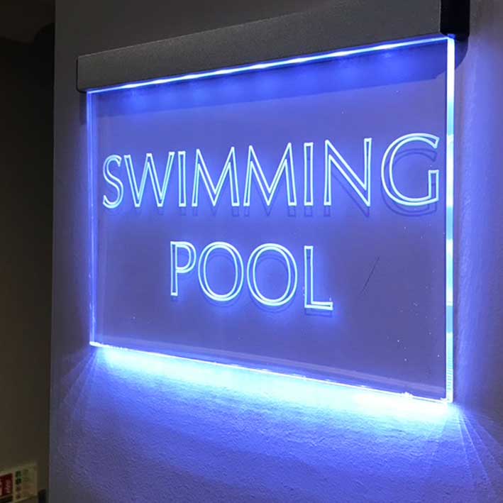 Illuminated swimmking pool sign edge lit engraved.