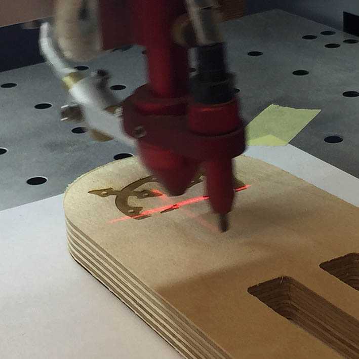 laser engraving logo onto furiture components