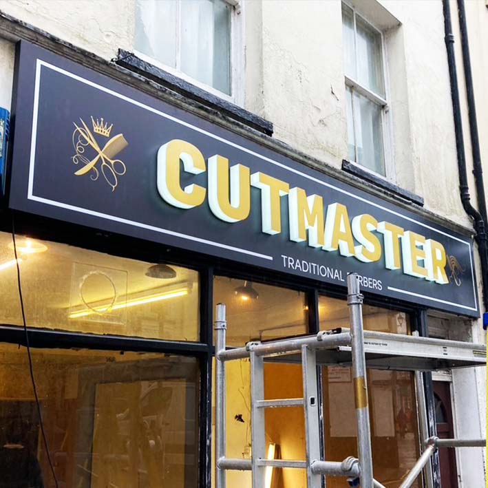 Cutmaster barbers sign in Launceston with built up lettering and logo